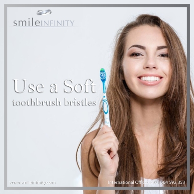 47360052-portrait-of-a-smiling-cute-woman-holding-toothbrush-isolated-on-a-white-background copy.jpg